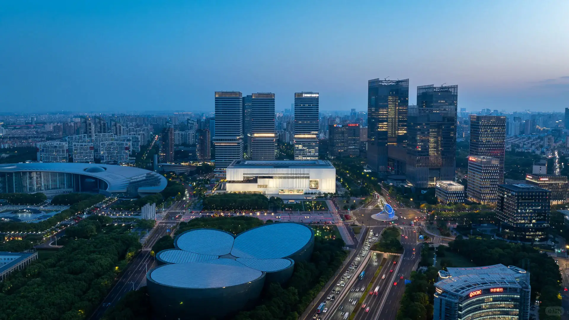 Night view of Shanghai Museum East Hall showcasing transparent structure and lighting