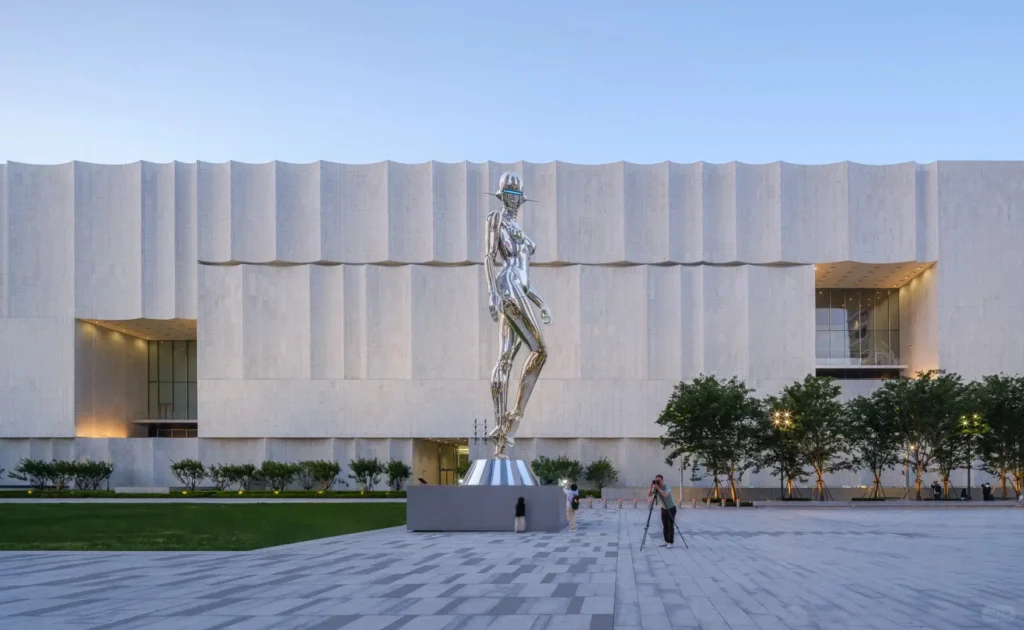 Shanghai Museum East Hall exterior with wave-like white granite façade